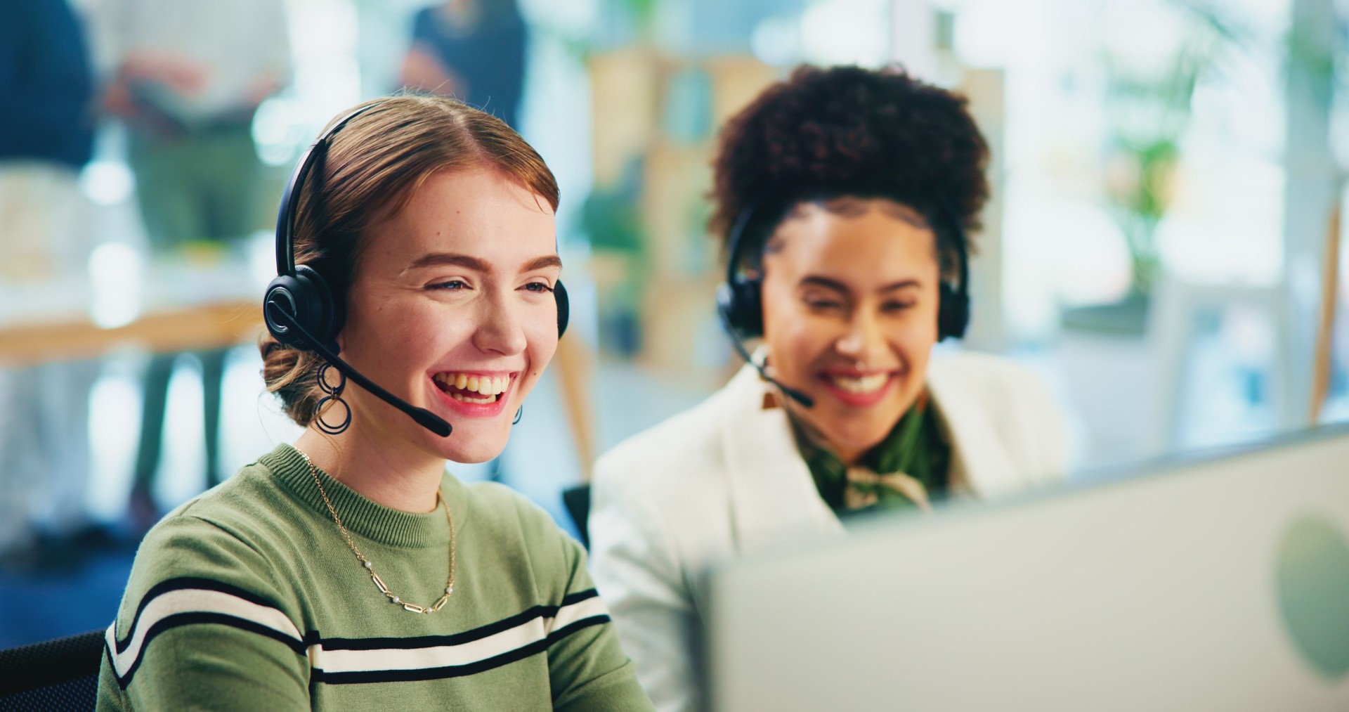 Consultant, business women and happy with computer for telemarketing, sale commission and pride. Coworking, people and friends with teamwork for customer service, support goals and excited in office